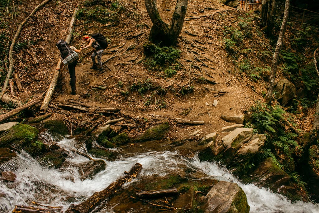 Cossing rivers during hikes can make it challenging if you prefer dry feet